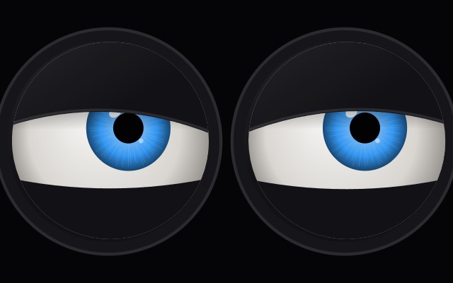 Two round displays showing stylised eyeballs looking up and aside while thinking